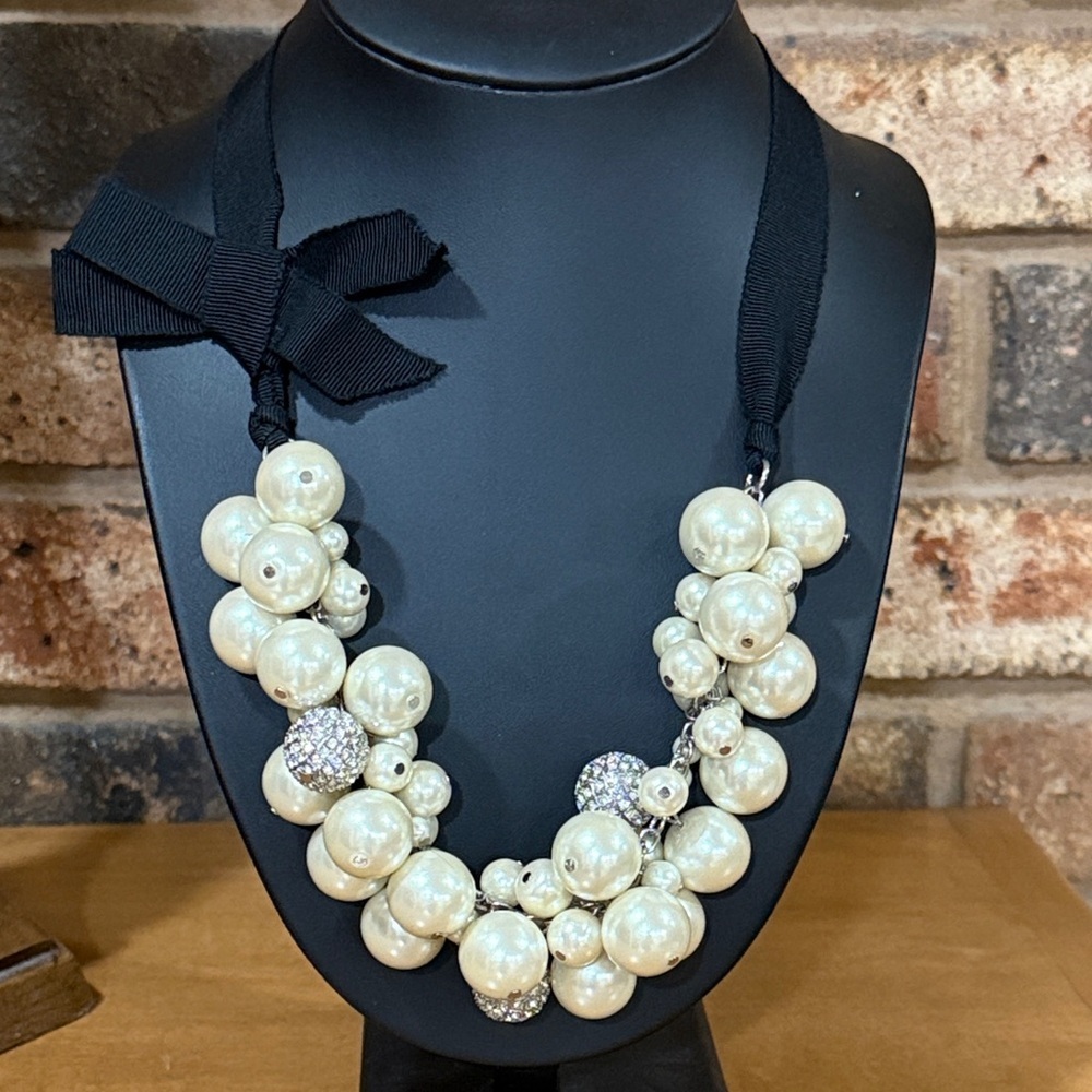 Faux Pearl and rhinestone statement necklace bow detail